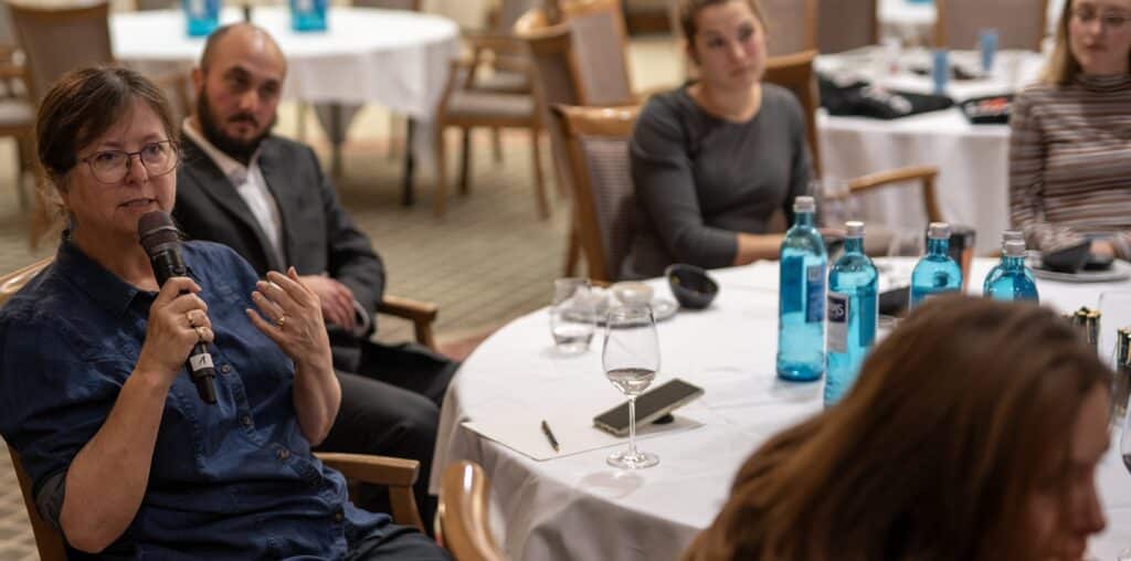 Audience member asking questions