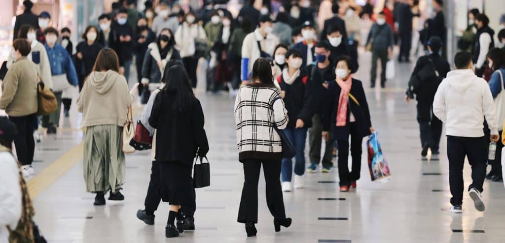 Masked commuters in Osaka, Japan