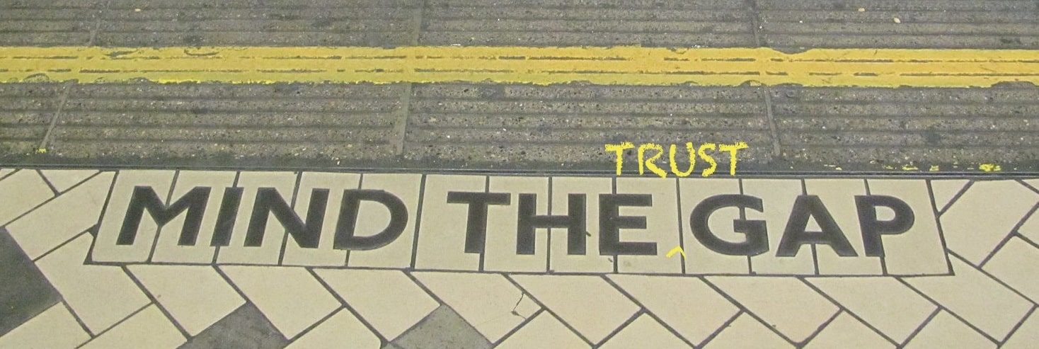 Photo of mind the gap sign with trist written over it